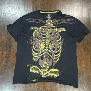 Y2K skeleton graphic tee with a faded look